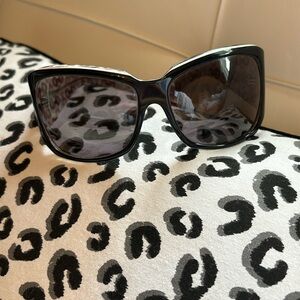 Gucci sunglasses , black with white trim at top. No case, very good condition